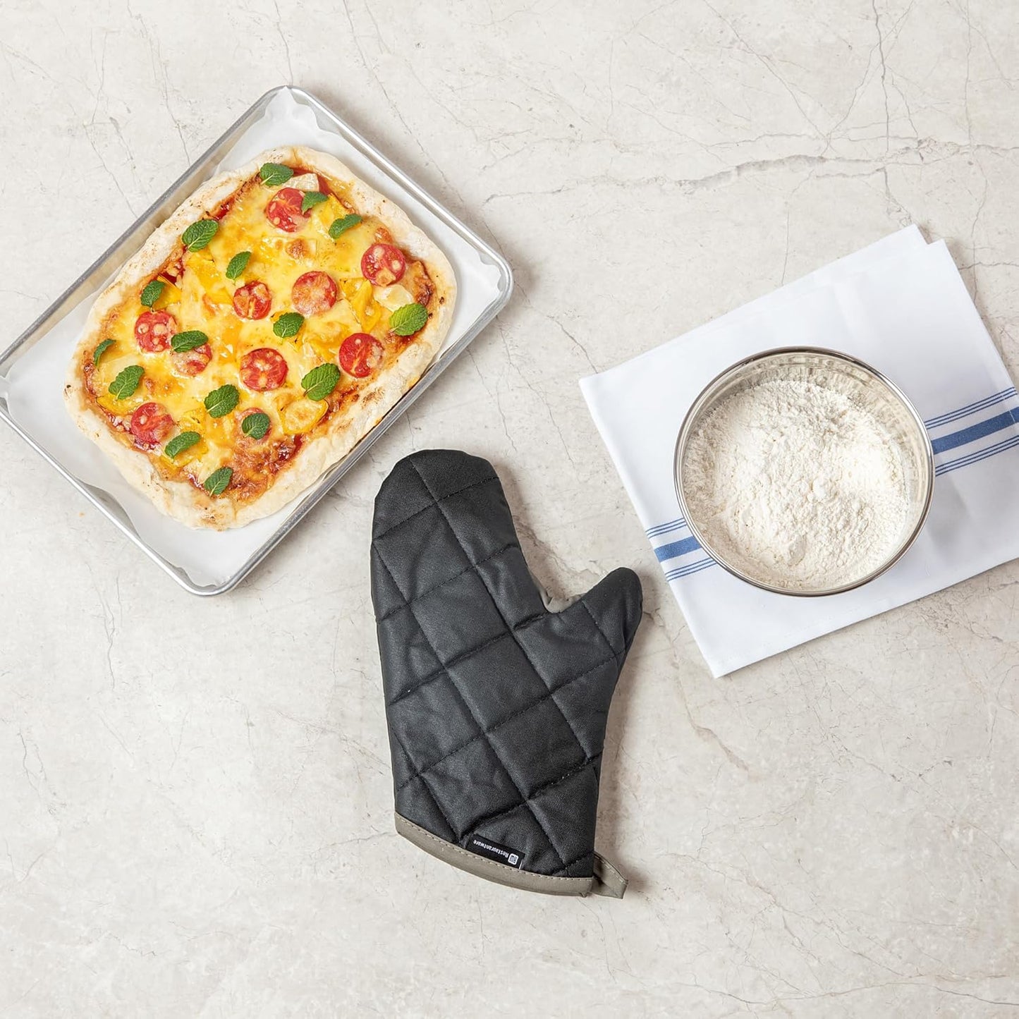 Restaurantware 13.7 x 8 Inch Heavy-Duty Oven Mitt 1 Flame Retardant Heat-Resistant Kitchen Glove - With Thumb Guard Hanging Loop Black Cotton Quilted Glove Heat-Resistant For Cooking And Baking