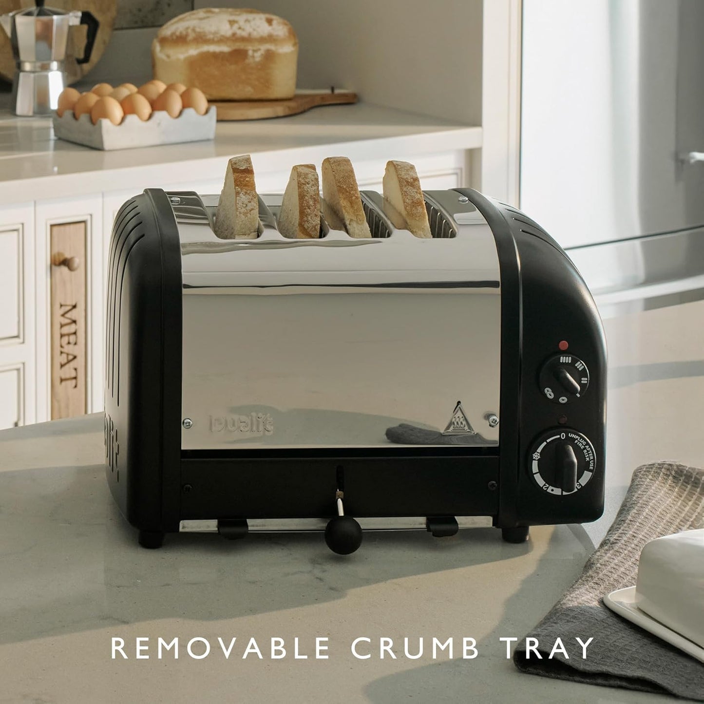 Dualit Classic 4 Slice NewGen Toaster - Stainless Steel - Hand Built in the UK - Replaceable ProHeat elements - Defrost Bread - Mechanical Timer - Matt Black Classic Toaster