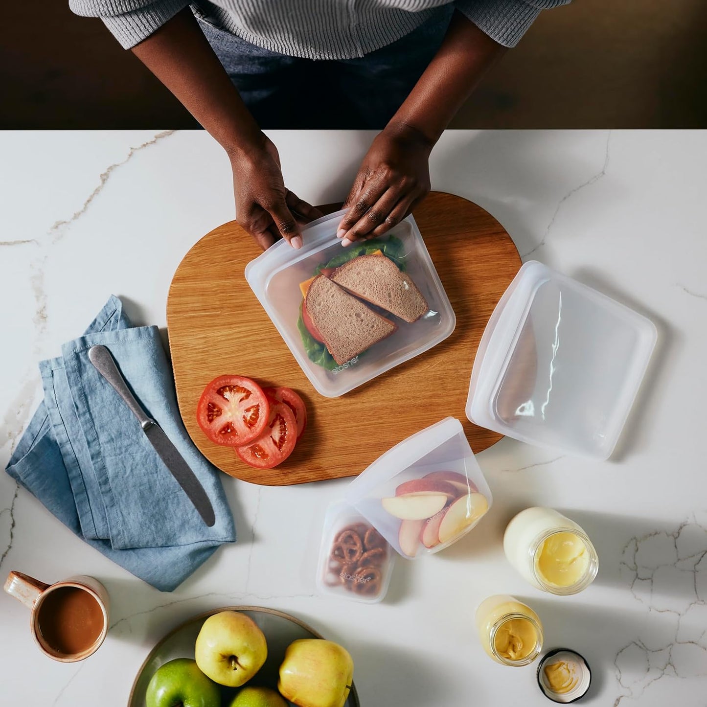 Stasher Premium Silicone Reusable Food Storage Bags and Stretch Lids 10-Pack, Clear, Airtight Seal, Food Containers & Covers, Boxed Starter Kit, BPA Free, Leak-free, Dishwasher Safe, Eco-Friendly